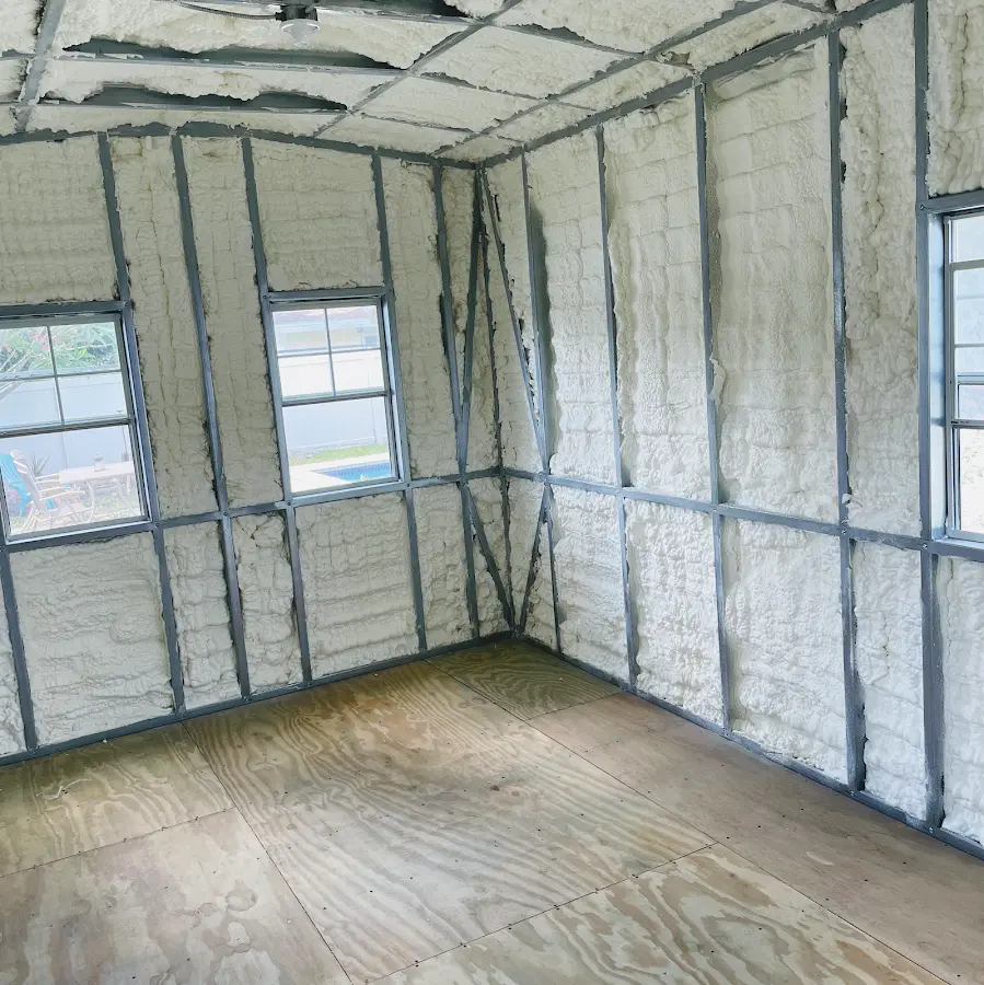 Closed-cell spray foam insulation applied to wall cavities in a residential project in Melrose Park